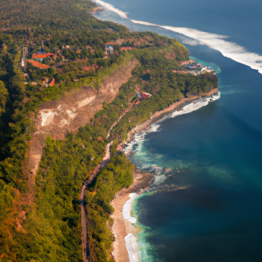 נוף אווירי עוצר נשימה של קו החוף של באלי, המציג את החופים הציוריים והנופים השופעים.